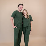 Couple wearing matching Lounge Pants and tops in Fir 