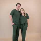 Couple wearing matching Lounge Pants and tops in Fir 