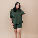 Women modeling the Kyte Women's Biker Short Set in Fir