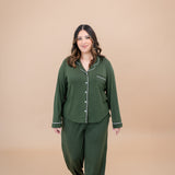 Model walking towards camera while wearing the Women's Long Sleeve Pajama Set in Fir