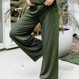 Close up of the  Women's Wide Leg Pant in Fir with one leg up