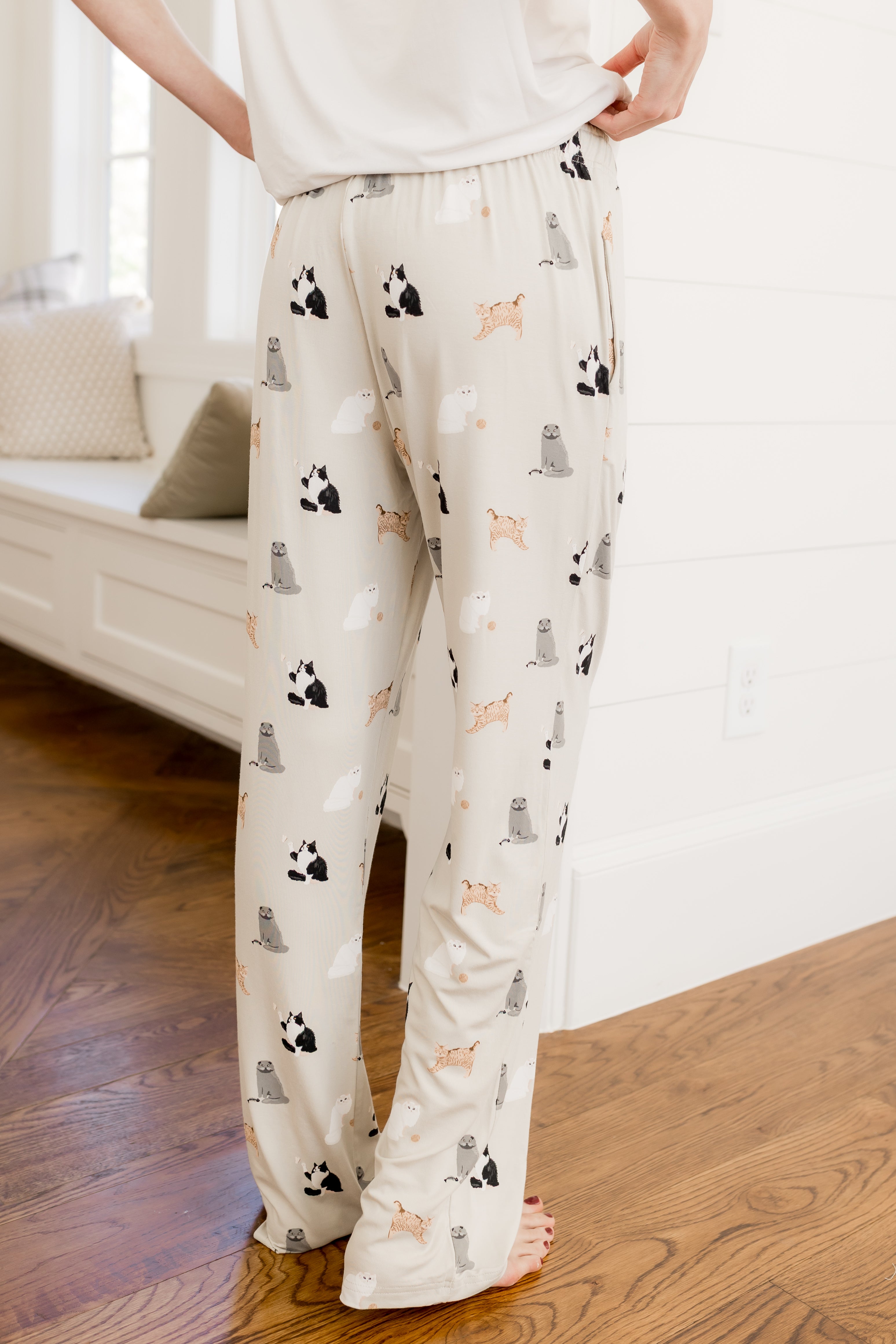 Back side of Women's lounge pant with Fluffy Cat print under a white tee