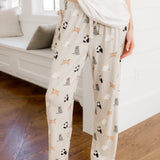 Person wearing Women's lounge pant with Fluffy Cat print under a white tee 