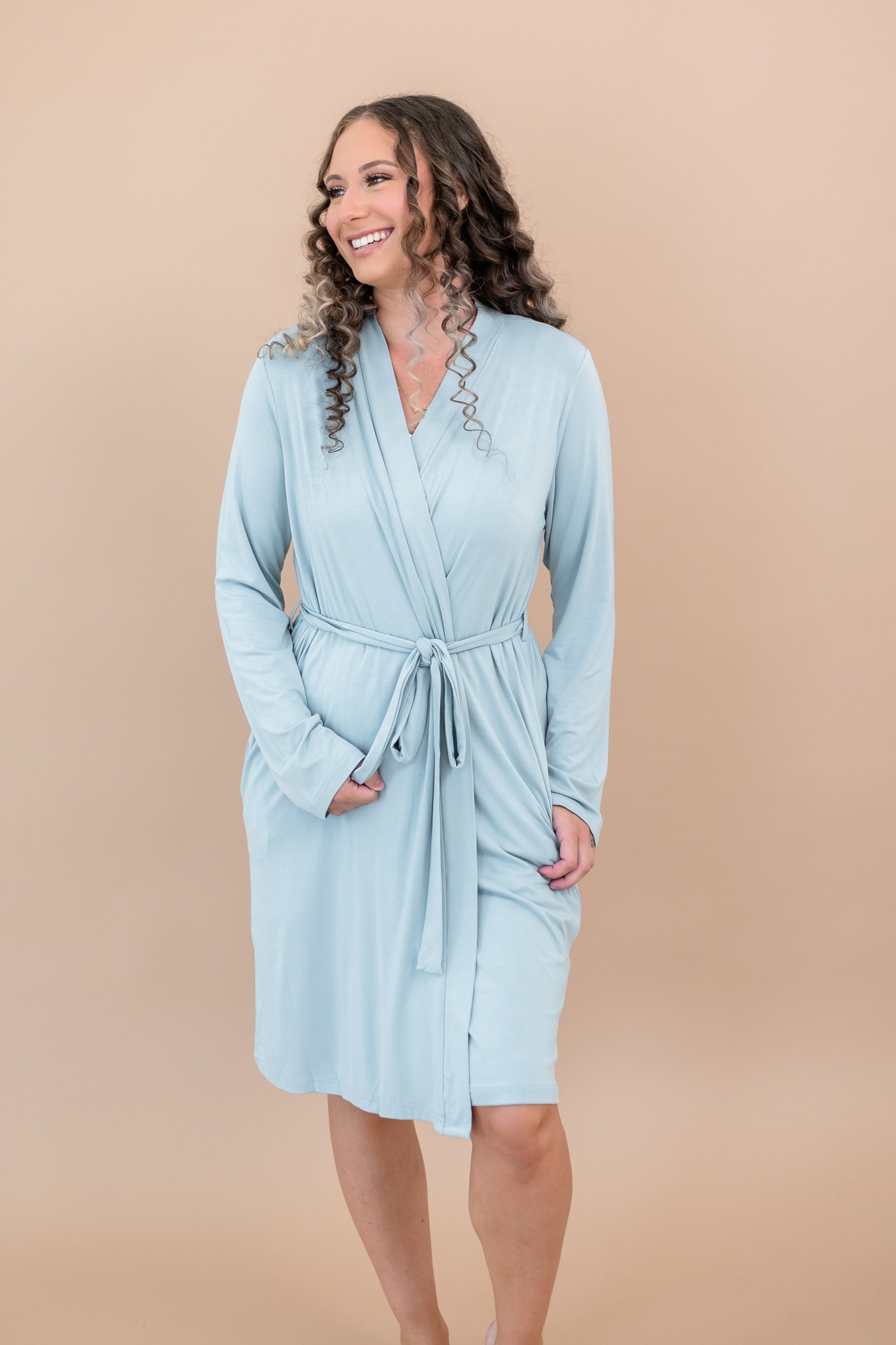 Woman wearing Women’s Lounge Robe in Fog against a beige background