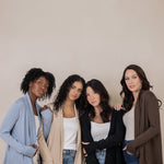 Models standing next to each other while wearing the Women's French Terry Wrap Top in Slate, Almond, Midnight and Espresso