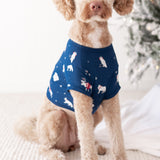 Large sized dog wearing the Dog Tee in Frosty Friends in front of a decorated Christmas Tree