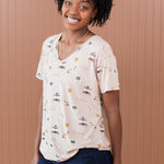 Smiling model wearing the Women's V Neck in Gilmore Girls