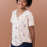 Smiling model wearing the Women's V Neck in Gilmore Girls