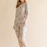 Woman standing infront of a beige background while modeling the Women's Jogger Pajama Set in Gilmore Girls

::: Model is 5'8" wearing size S ///