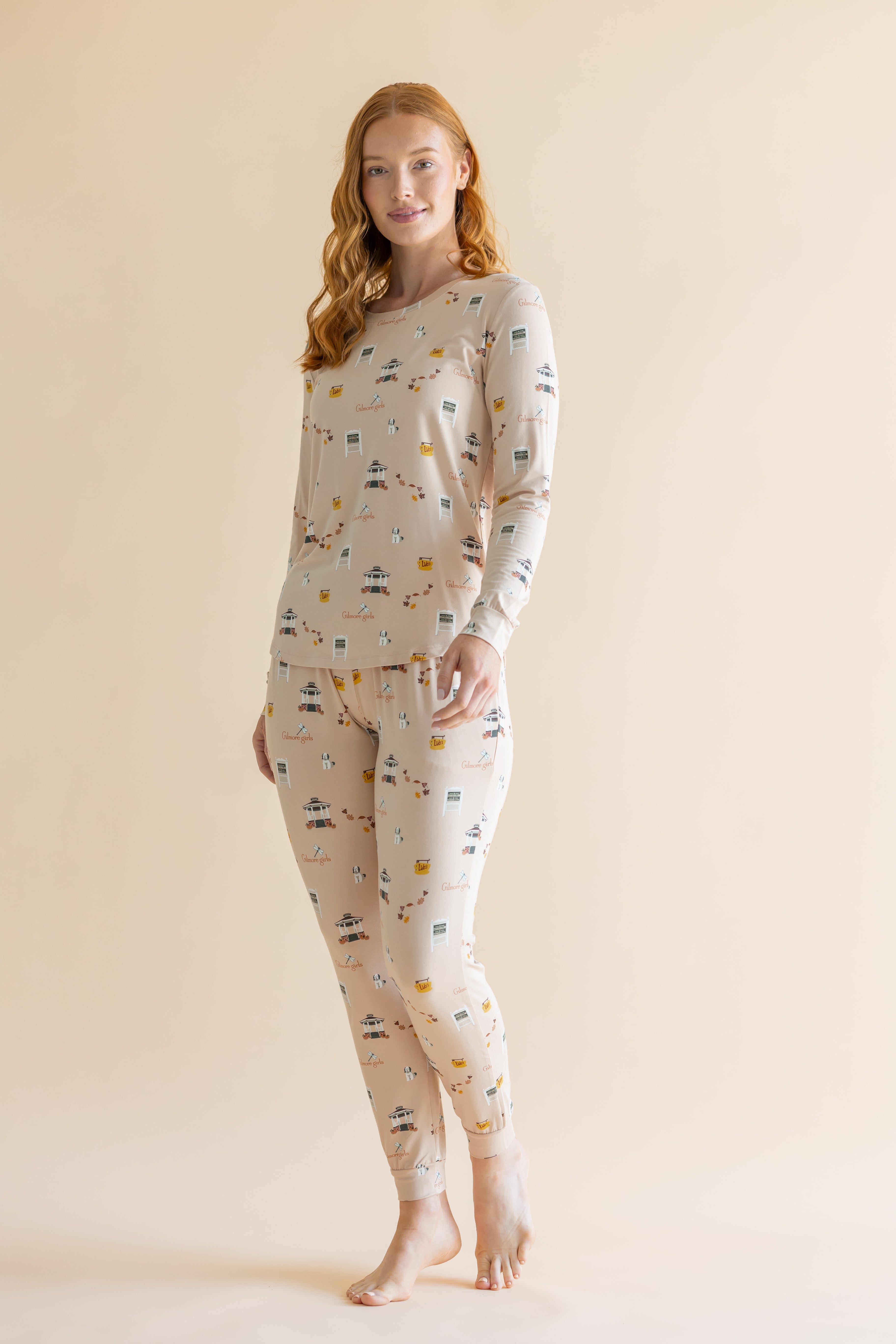 Woman standing infront of a beige background while modeling the Women's Jogger Pajama Set in Gilmore Girls

::: Model is 5'8" wearing size S ///