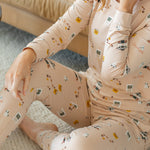 Close up of the Women's Jogger Pajama Set in Gilmore Girls while woman is sitting on the floor