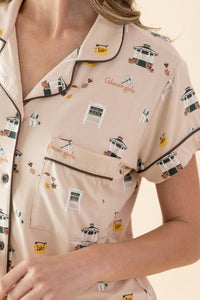 Close-up of a pajama top with a 'Gilmore Girls' theme on a beige background

---PJ 2