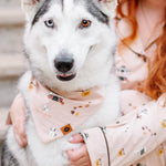 Female model wearing the long sleeve women's pajama set in gilmore girls sitting on stairs beside a husky wearing the Dog Bandana in Gilmore Girls