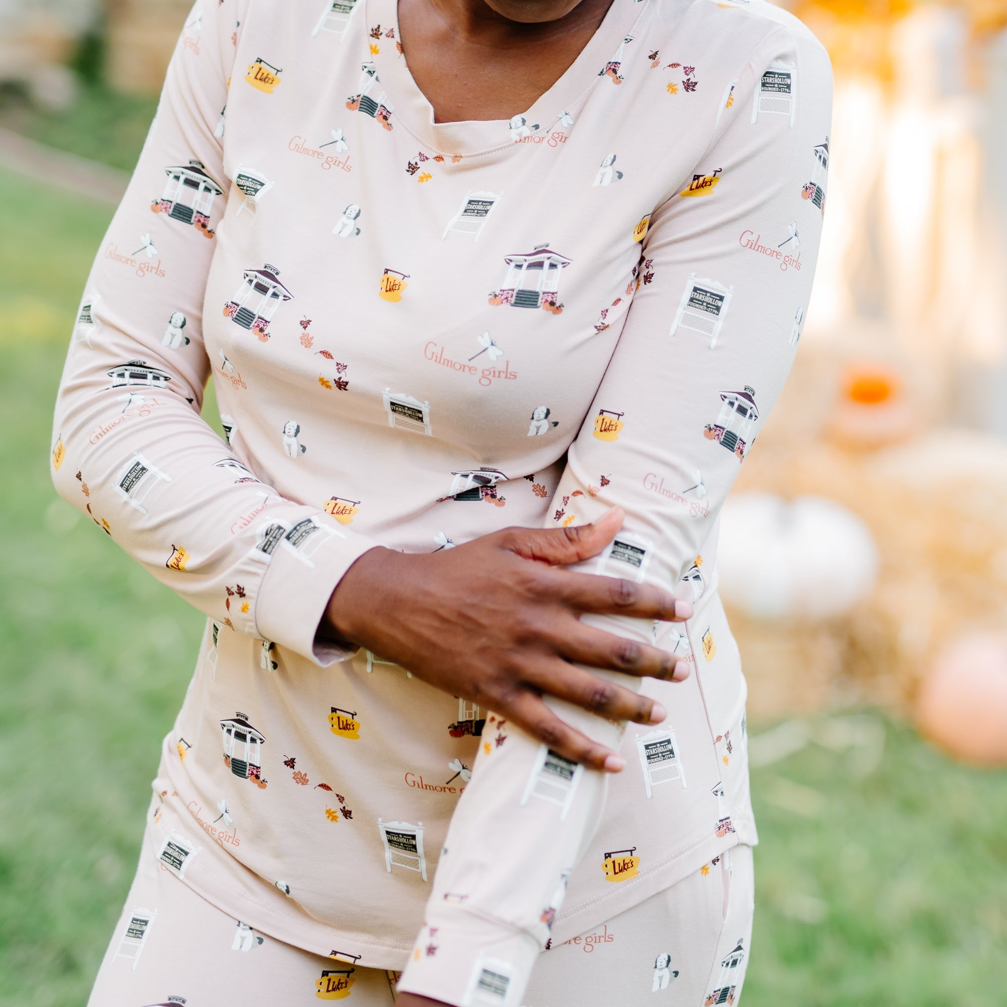 Close up of the fabric of the Women's Jogger Pajama Set in Gilmore Girls shown on a model