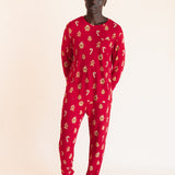 Man with his hands behind his back wearing a jogger set in gingerbread print.
::: Model is 6'1" wearing size L ///