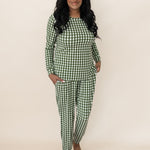 Woman smiling while modeling the Kyte Bamboo Women's Jogger Pajama Set in Gingham Fir