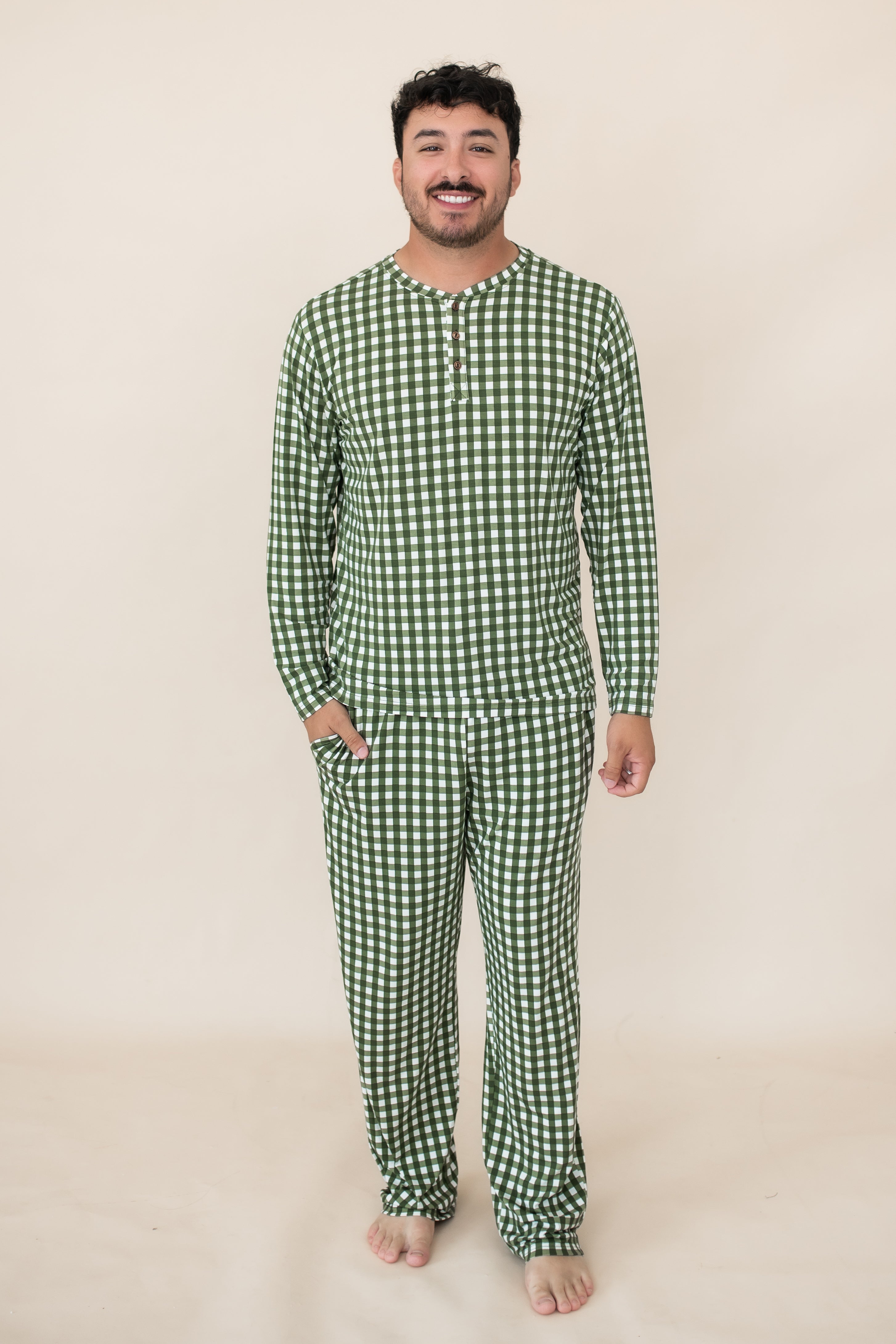 Smiling model wearing the Bamboo Men's Jogger Set in Gingham Fir