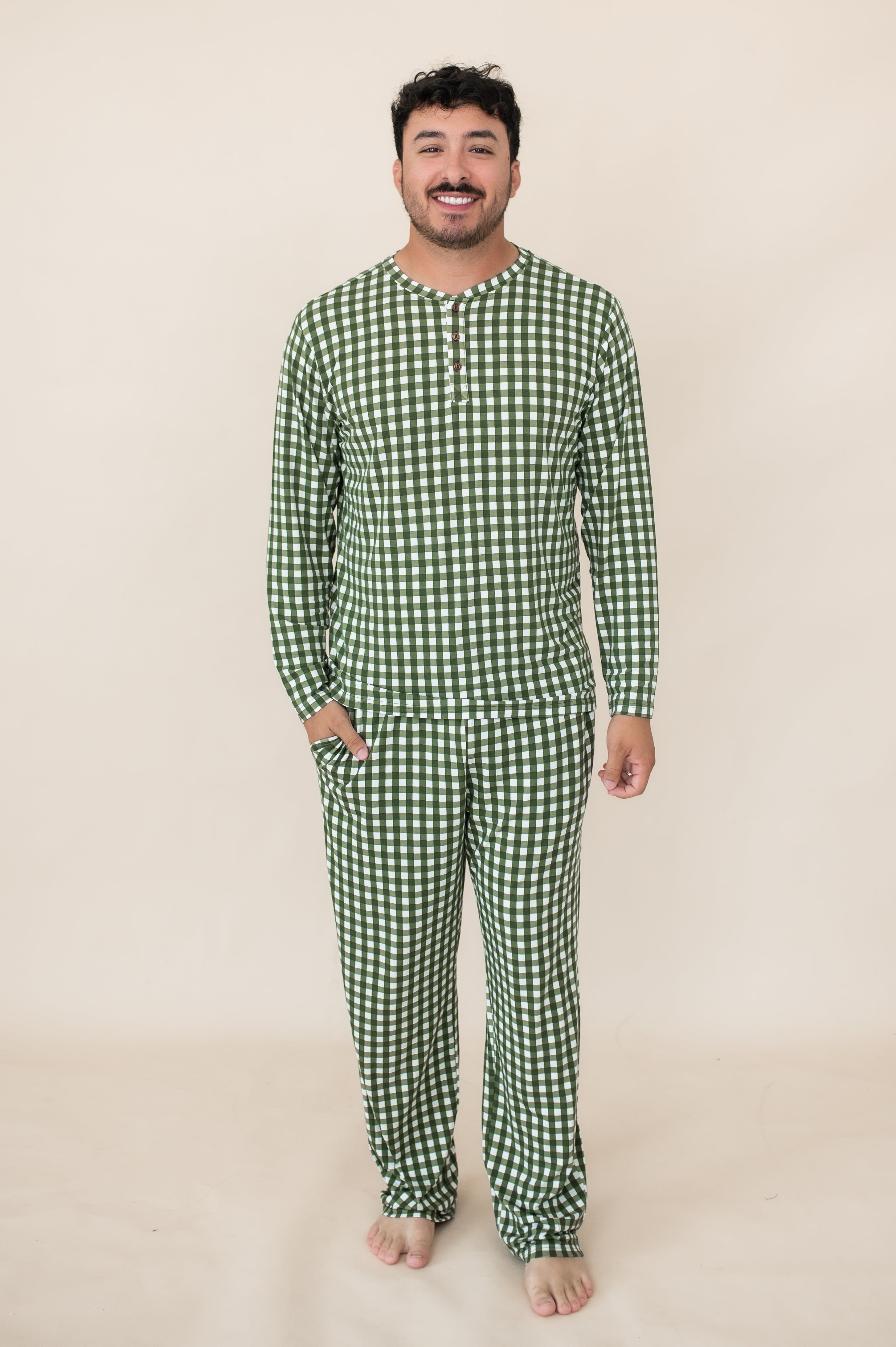 Smiling model wearing the Bamboo Men's Jogger Set in Gingham Fir