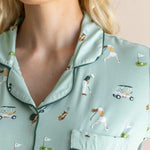 Model showcasing the Neck of Women's Short Sleeve Pajama Set in Golf print