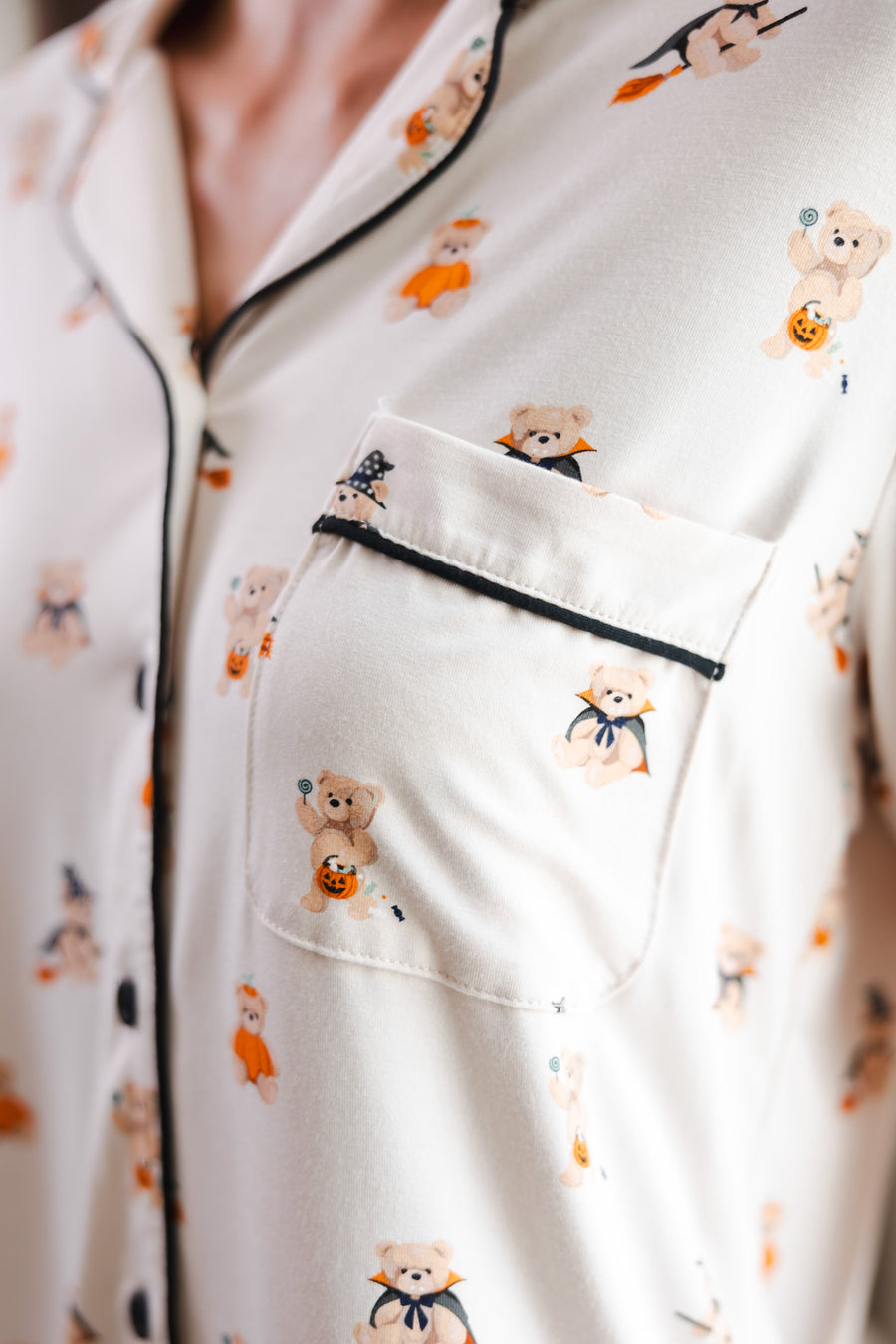 Close up of Modal wearing Beige Long-Sleeved Women's Pajama Set in Halloween Teddy print with pocket