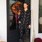 Model posing in Men's Long Sleeve Pajama Set in Halloween Friends print standing in doorway  ::: Model is 6'2" wearing size L ///