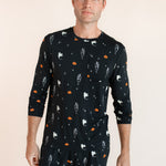 Modal wearing Men's Jogger Set in Halloween Friends print on beige background