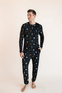 Modal wearing Men's Jogger Set in Halloween Friends print on beige background