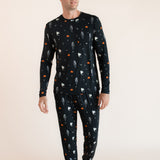 Modal wearing Men's Jogger Set in Halloween Friends print on beige background
