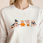 Close up of Modal wearing off white Women's Sweatshirt with Halloween Teddy print in the center