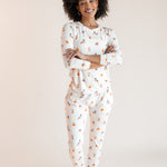 Modal wearing Women's Jogger Pajama Set in Halloween Teddy print on a beige background