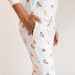 Modal showcasing the jogger pajama pockets of Women's Jogger Pajama Set in Halloween Teddy print on a beige background