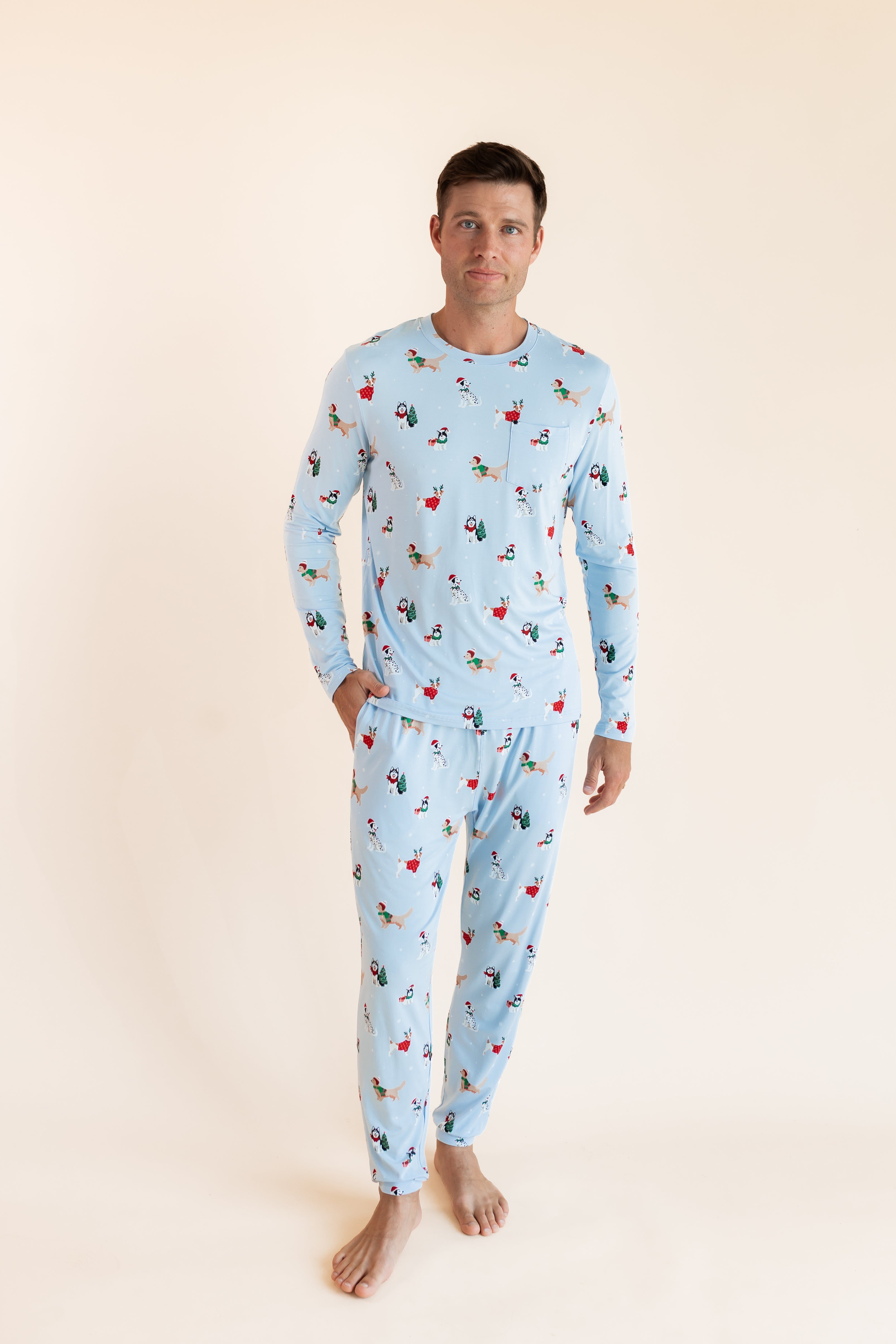 Man wearing Men's Jogger Set in Holiday Pups print on a beige background
::: Model is 6'2" wearing size M ///