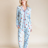Woman wearing Long-Sleeved Women's Pajama Set in Holiday Pups print on a beige background
::: Model is 5'10" wearing size S ///
---1605 1