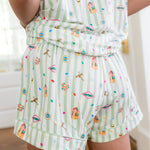 Back side view of the bottoms from the Women's Short Sleeve Pajama Set in Honeydukes on a model 