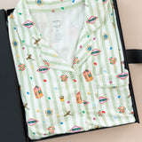 Women's Short Sleeve Pajama Set in Honeydukes print packed in a box on a beige background