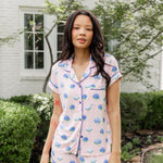 Woman outside soft smiling in short sleeve and short pajamas in Hydrangea Sakura print. ---1615 1