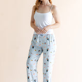 Model wearing blue Women's Lounge Pants with Sushi print under white camisole on a beige background. "::: Model is 5'8"" wearing size M ///
