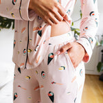 Person wearing a sushi-themed pajama set in a casual setting. ---1605 1