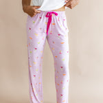 Close up of the Kyte Women's Lounge Pants in Cocktail paired with a top in snow
::: Model is 5'9" wearing size S ///