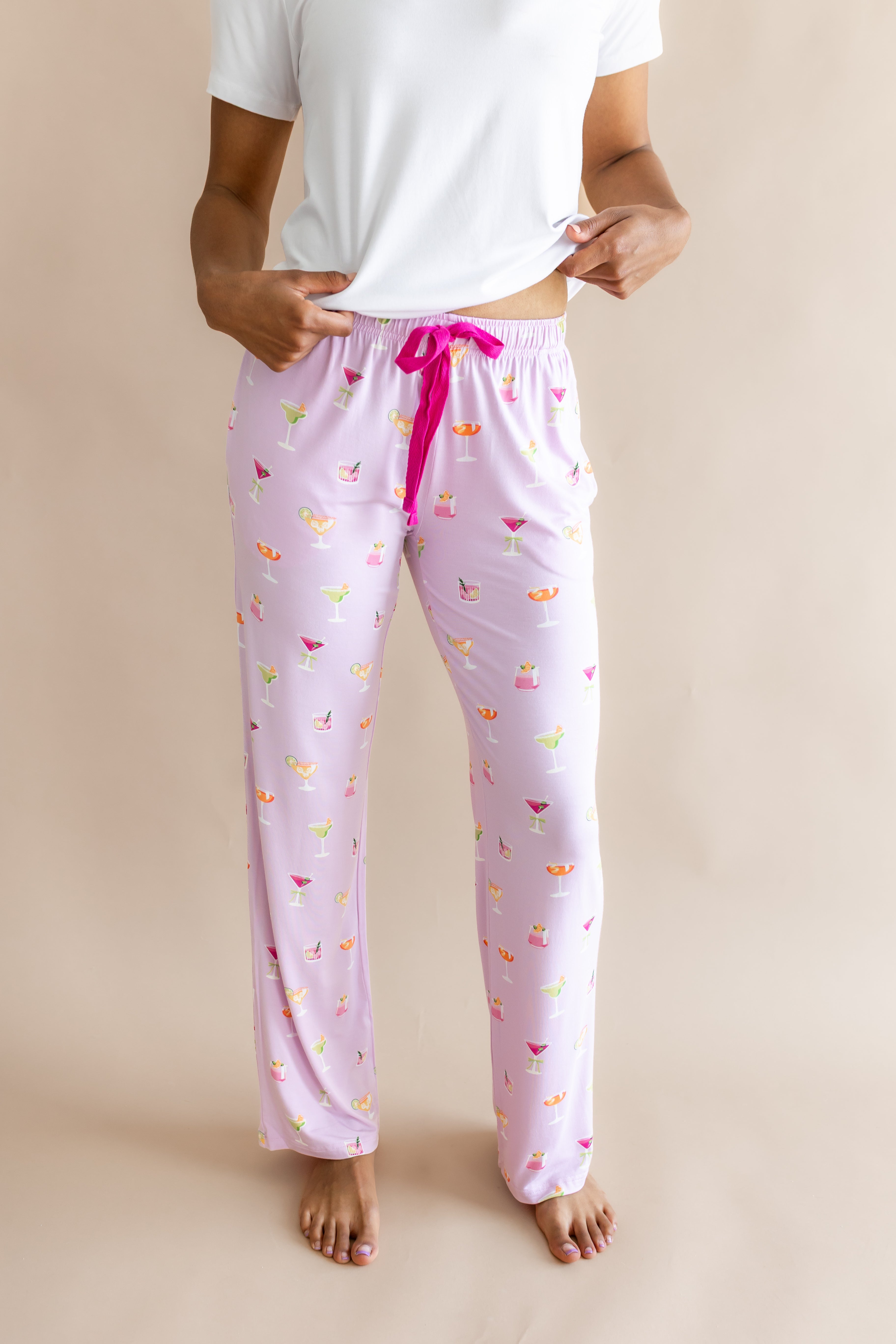 Close up of the Kyte Women's Lounge Pants in Cocktail paired with a top in snow
::: Model is 5'9" wearing size S ///