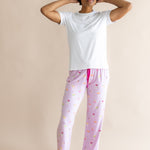 Model with hands on her head while wearing the Women's Lounge Pants in Cocktail