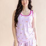 Smiling woman standing in front of a beige back ground while modeling the Women's Tank Set in Cocktail
::: Model is 5'6" wearing size S ///