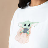 Close up of the Yoda character on a Women's Graphic Tee in The Child™