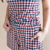 Close up of the Women's Tank Set in Patriotic Gingham with hand in her pocket 