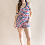 Full body of model wearing the Women's Tank Set in Patriotic Gingham with one hand on hip with a beige back ground 