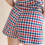 Close up of the back side of the bottoms from the Women's Tank Set in Patriotic Gingham on  a model 