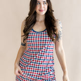 Brunette model smirking to the side while modeling the Women's Tank Set in Patriotic Gingham 