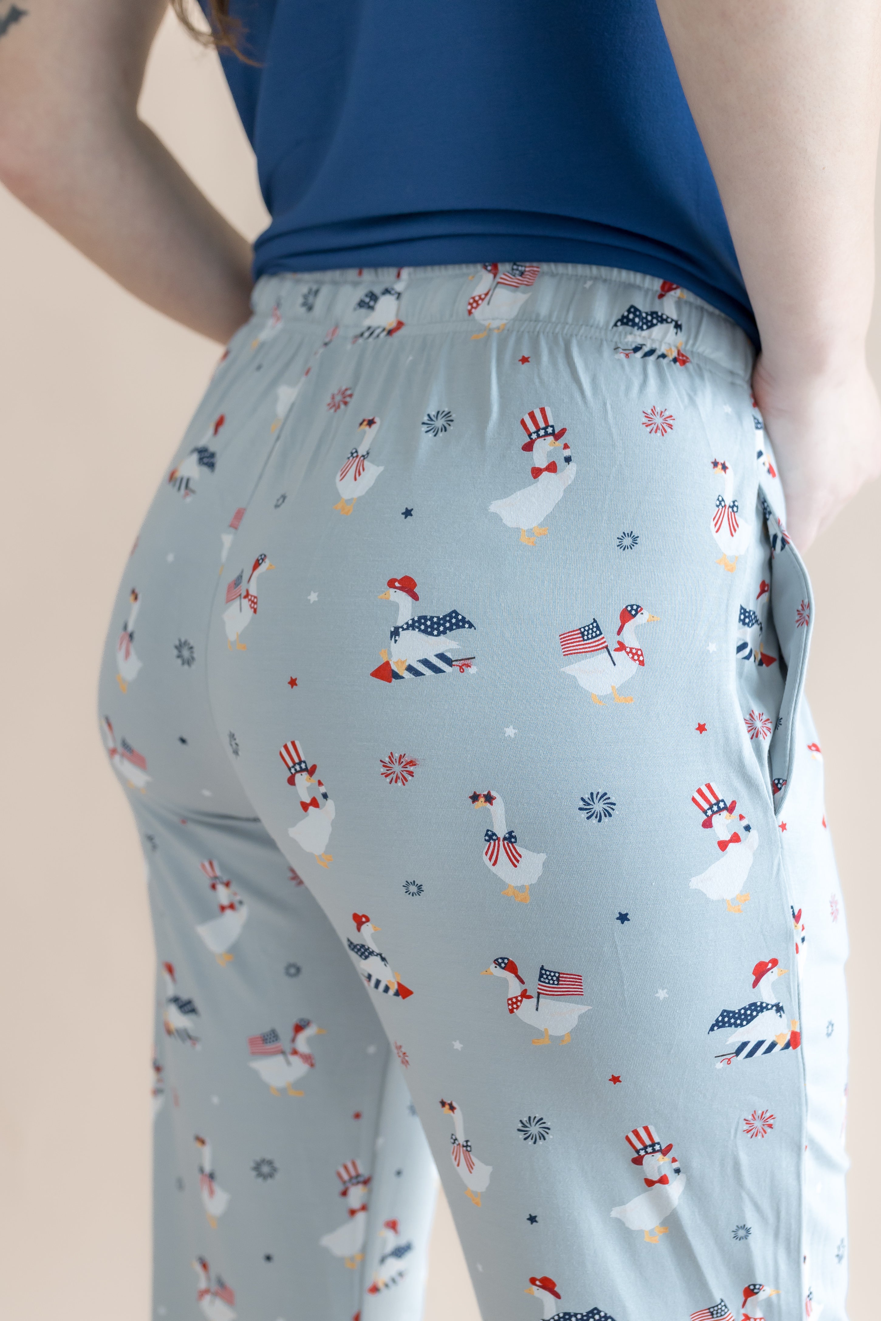 Close up of the back side of the Women's Lounge Pants in Patriotic Goose on a model 