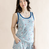 Model smiling with hand in pocket while modeling the Women's Tank Set in Patriotic Goose

::: Model is 5'6" wearing size S ///