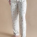Close up of the bottoms from the Long-Sleeved Women's Pajama Set in Starry Icon while on a model 